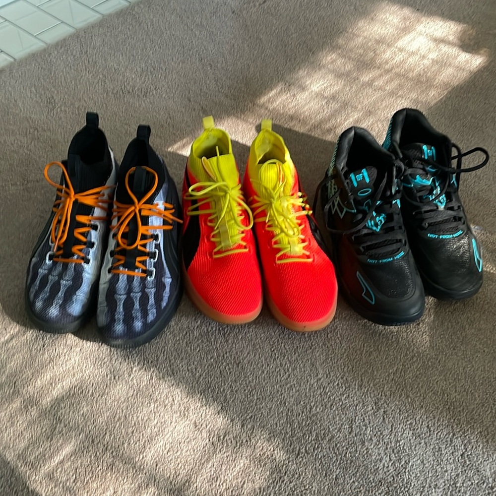 3 pairs of Puma basketball shoes